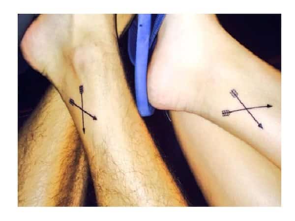 Crossed Arrows Ankle Tattoo
