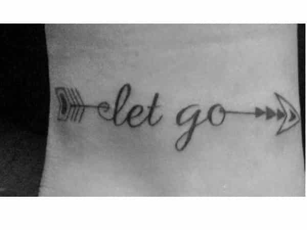Let Go Arrow Ankle Tattoo