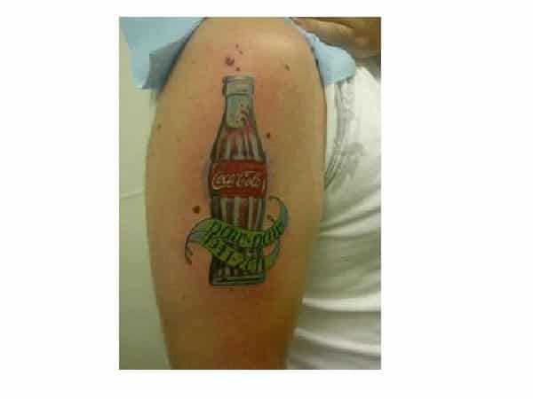 Coca Cola Bottle Arm Tattoo with Green Banners Memorial Tattoo