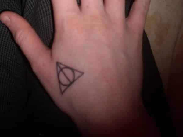 Small Deathly Hallows Hand Tattoo