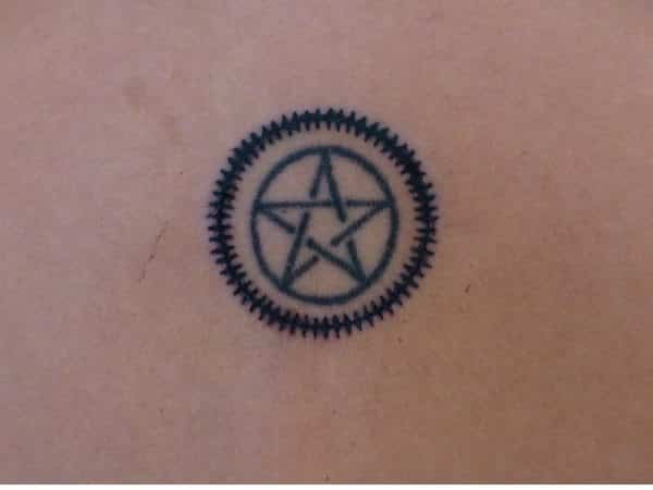 Pentagram Tattoo with Railroad Track Circle