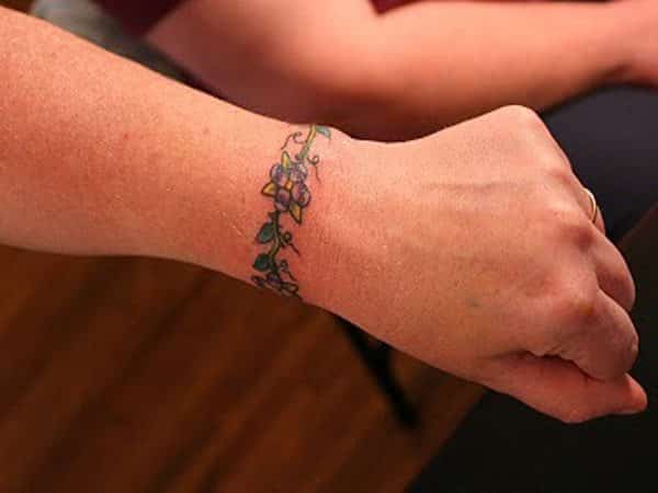 Colored Flower Bracelet Tattoo