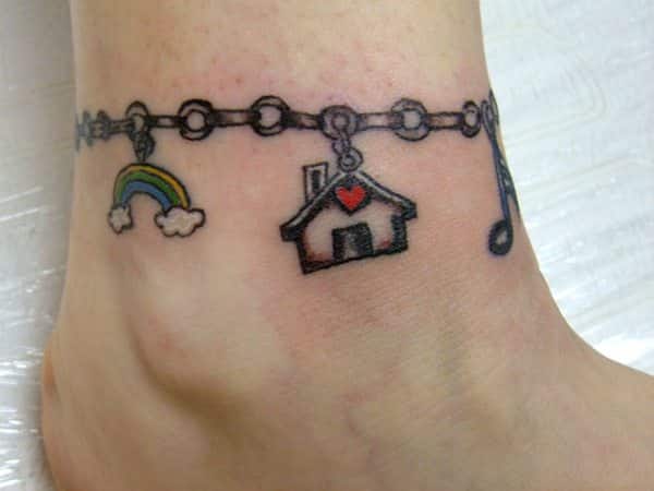 Rainbow, House and Musical Note Bracelet Tattoo
