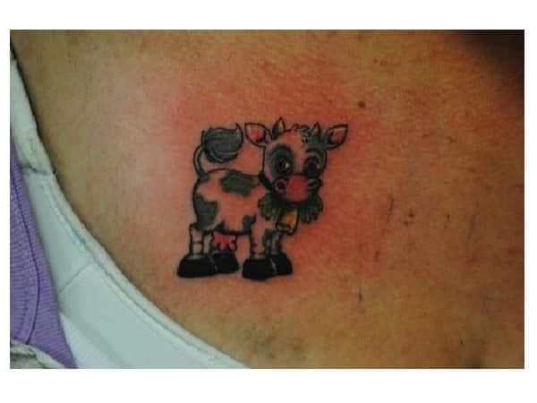 Cartoon Cow Eating Hay Tattoo
