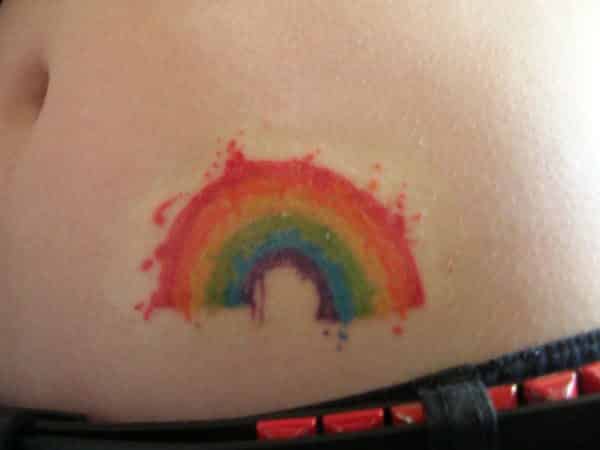 Splattered Rainbow Arch Tattoo
