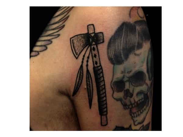 Tiny Tomahawk Tattoo with Long Feathers