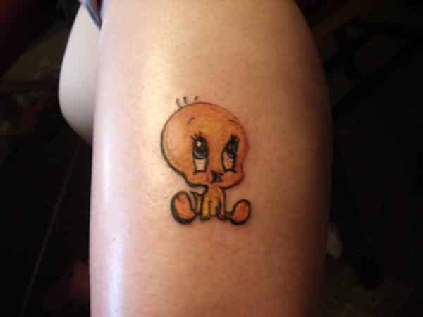 Sitting Tweety Bird Arm Tattoo