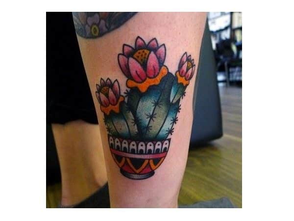 Cactus with Pink Flowers In Southwest Vase