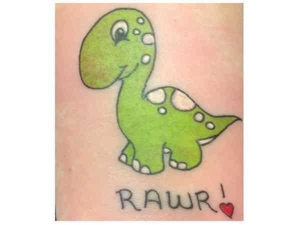Cute Green Cartoon Dinosaur Tattoo
