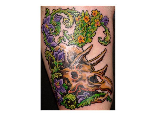 Dinosaur Skull with Flowers Tattoo