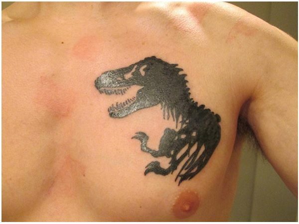 Black Dinosaur Skeleton Chest Tattoo