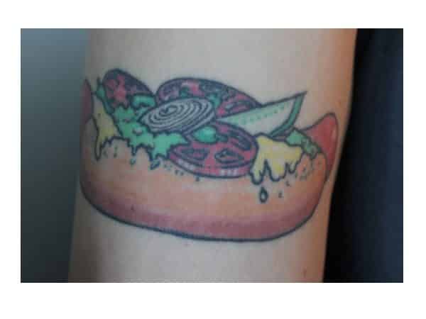 Hot Dog Tattoo with Mustard, Guacamole, Onions, Tomatoes, and a Pickle