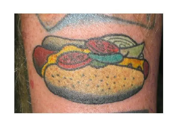 Cartoon Hot Dog Leg Tattoo with Mustard, and Tomatoes