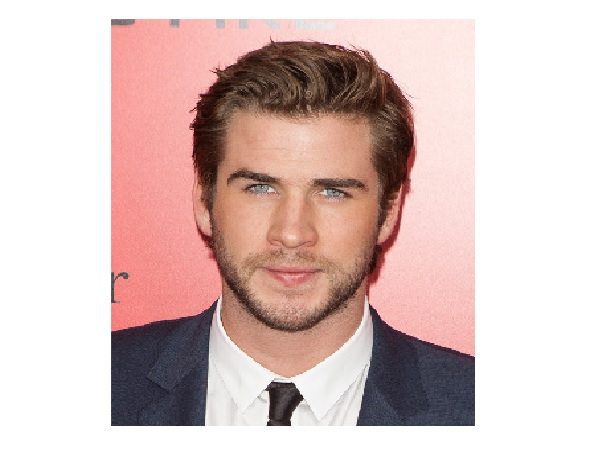 Liam Hemsworth Short Hair with Blond Highlights and Longer Bangs