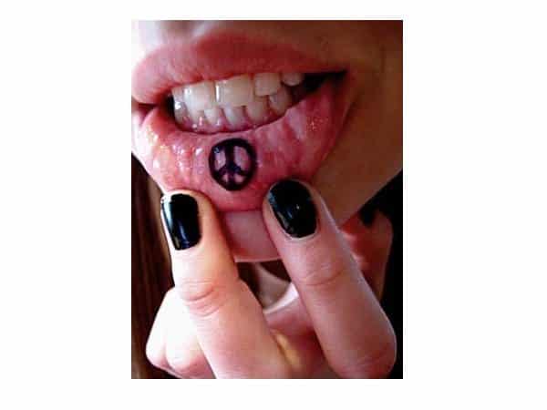 Peace Symbol Inner Lip Tattoo