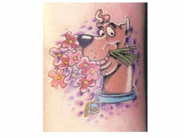 Scooby Doo Carrying Colored Bouquet of Flowers Tattoo