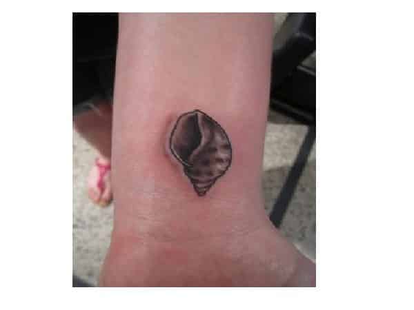 Small Colored Seashell Wrist Tattoo