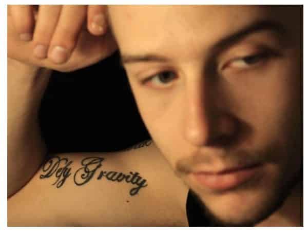 Defy Gravity Bicep Tattoo