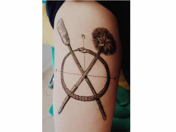 Crossed Broom and Wand Circle Wicked Tattoo
