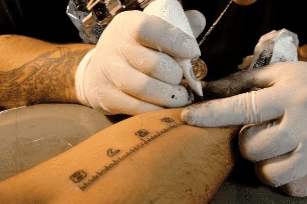 arm ruler tattoo