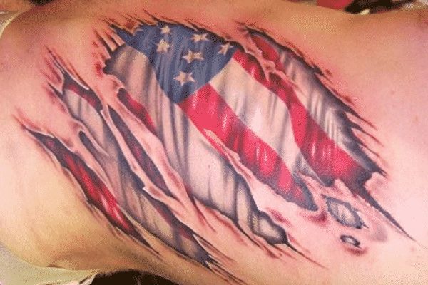Tattoo uploaded by Jordyn Grine Tattoo  Skin ripped American flag chest  plate and shoulder cap for a patriotic client americanflag  colorrealismtattoo skinrip chestpiece pectoral colortattoo  Tattoodo