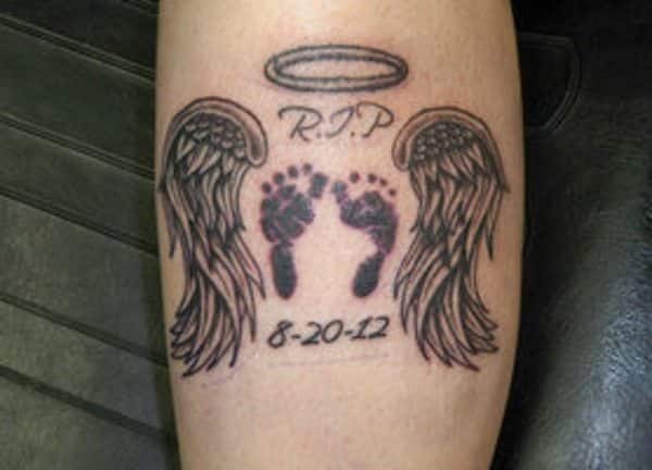 baby footprints with angel wings tattoos