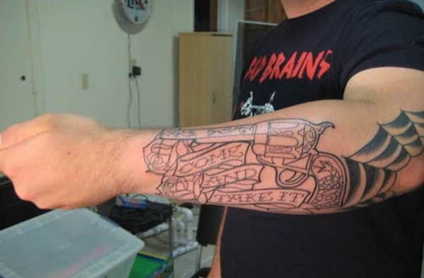 12 Hard Core Gun Tattoo Designs for Men