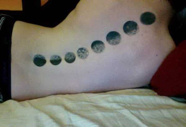 Spine moon phases tattoo is awesome and genuine idea for your next tattoo