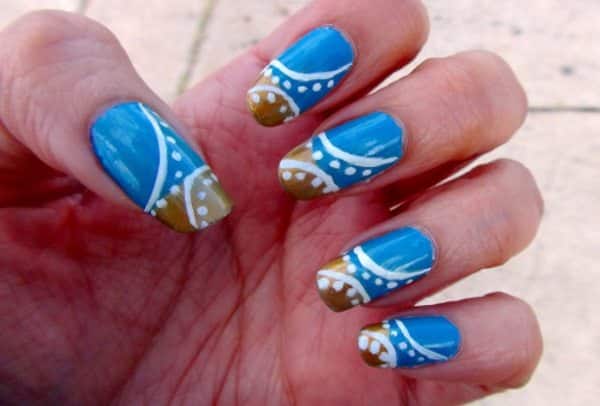 blue and gold nail art
