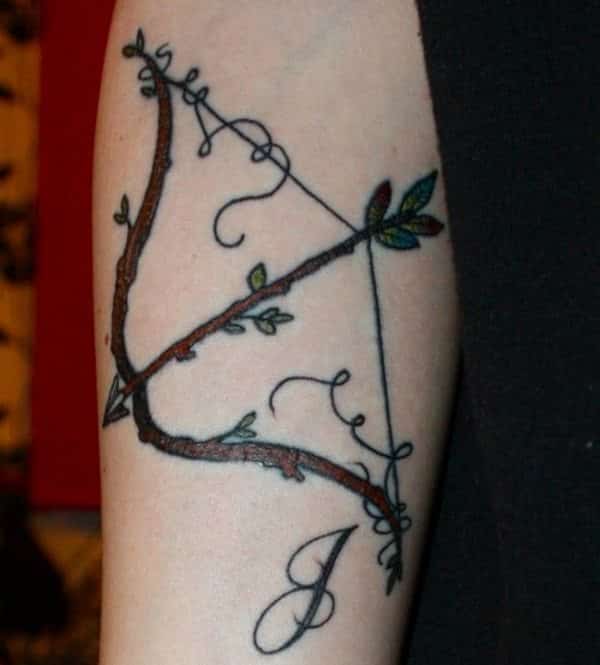 bow and arrow tattoo for women