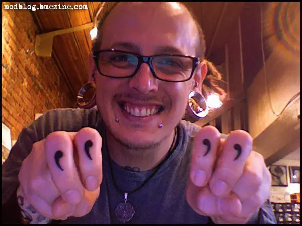 14 Clever and Funny Finger Tattoos