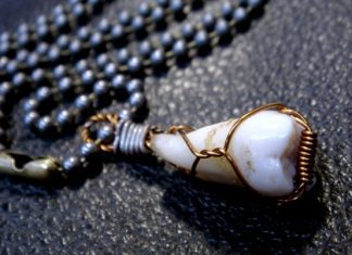 15 Hauntingly Beautiful and Creepy Human Tooth Jewelry Examples
