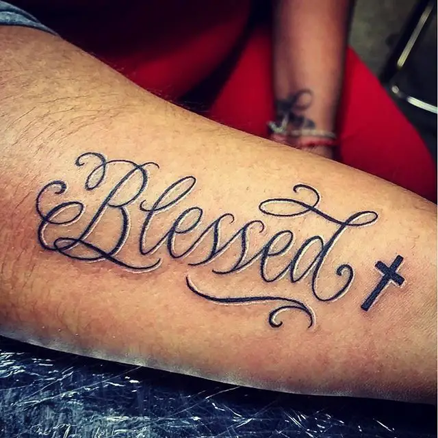 A blessed tattoo on a mans arm Stock Photo  Alamy