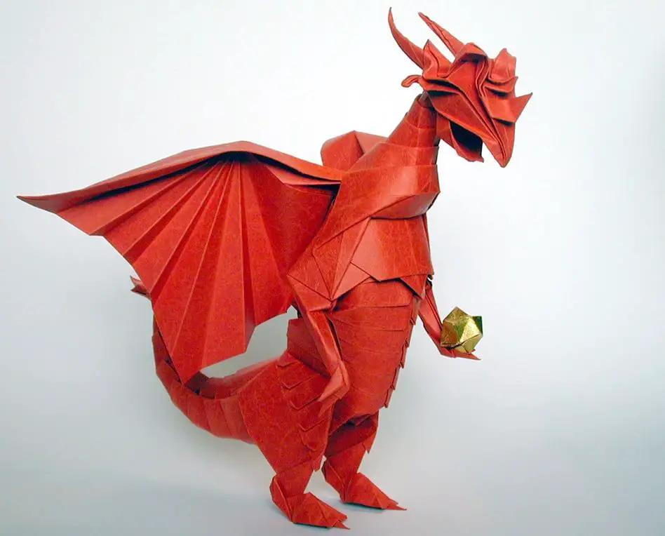 Драконы из бумаги быстро. Оригами. Бумажные драконы на руку. Дракон из бумаги. Оригами дракончик.