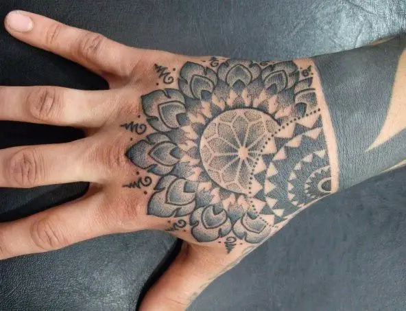 mandala hand tattoo