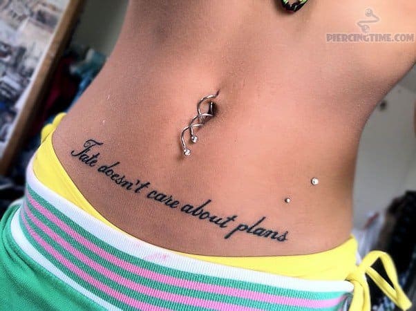 pelvic bone tattoos for women