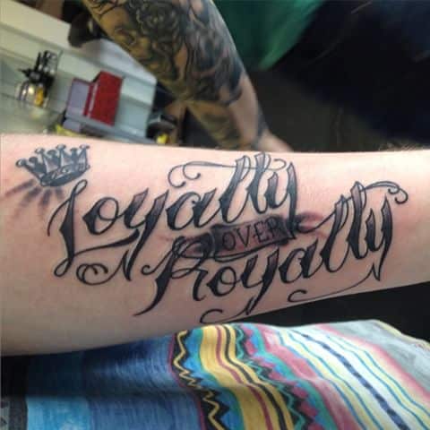Loyalty over royalty tattoo meaning