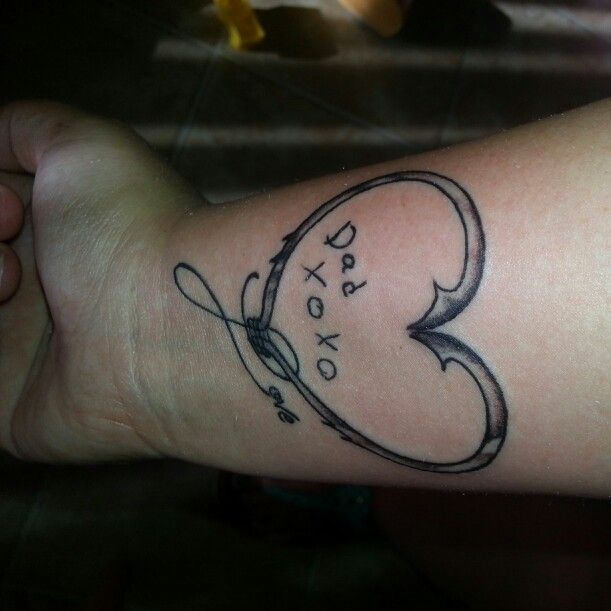 Fish Hook Tattoo On Left Foot