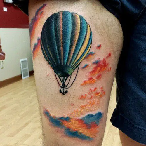 Air balloon tattoo on the ankle