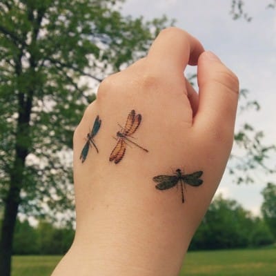 Dragonflies hand tattoos for women