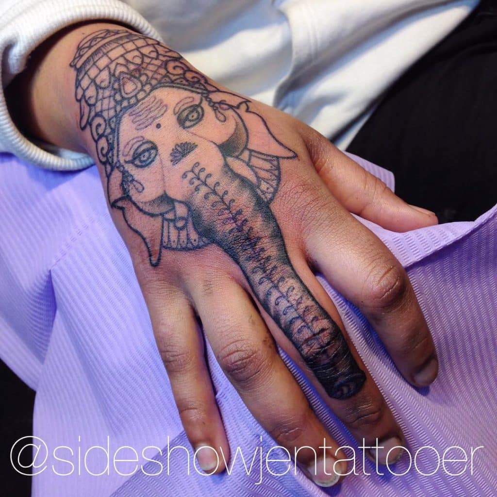 Ganesha hand tattoos for women