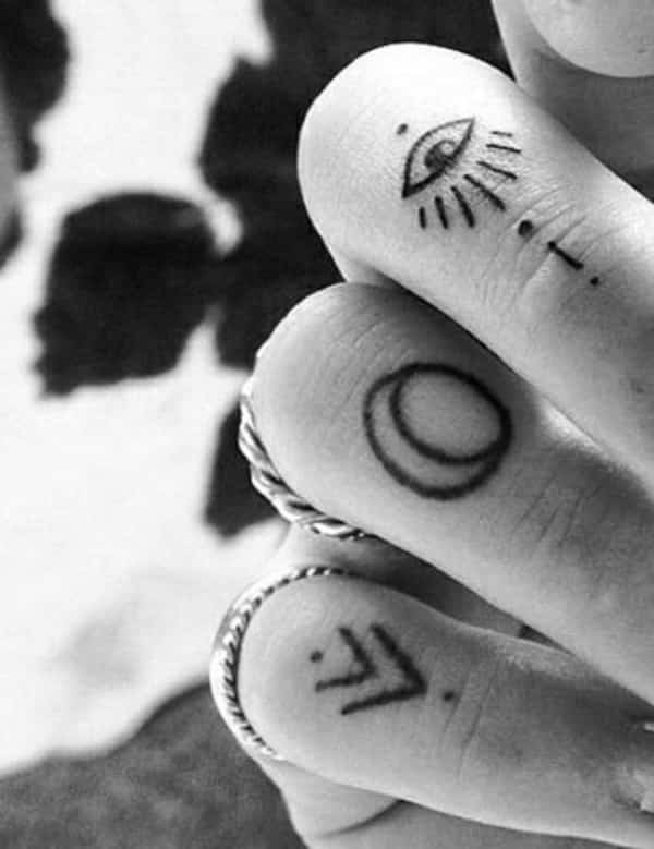Glyph hand tattoos for women