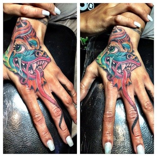 Karrueche's dragon hand tattoos for women