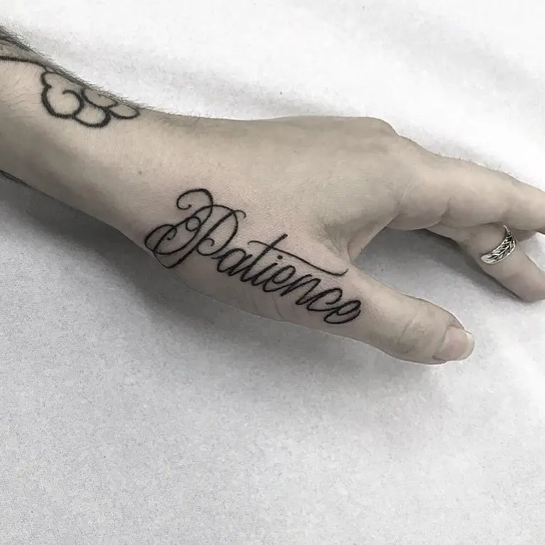 Patience hand tattoo for women