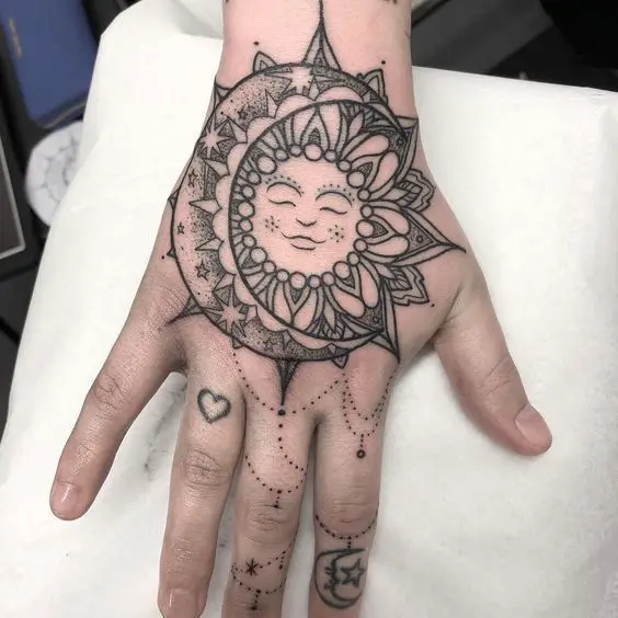 Sun Mandala hand tattoos for women