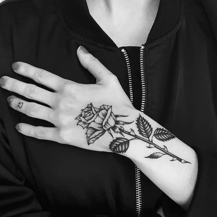 Thorned Roses hand tattoo for women
