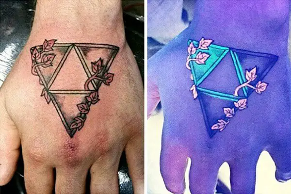 Triangular Glyph hand tattoos for women
