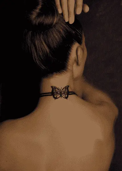 butterfly and a ribbon neck tattoos for women