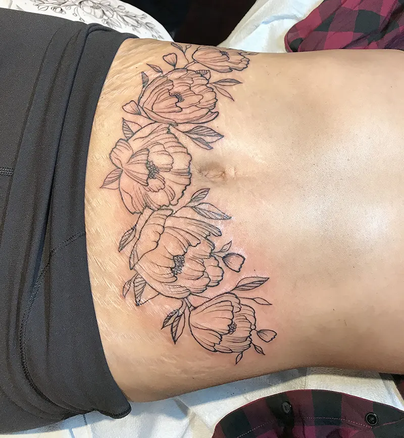 25 Awesome Stomach Tattoos To Cover Up Stretch Marks  EntertainmentMesh